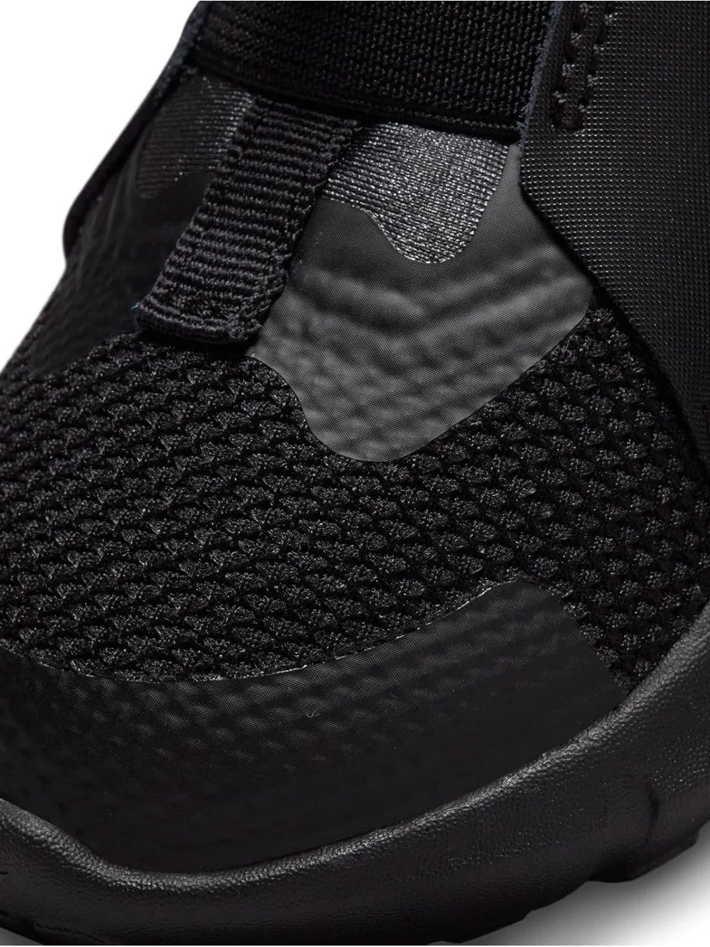 Nike Youth Black Slip-On Sneaker with White Swoosh and Blue Insole